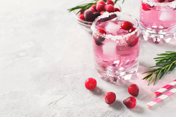 istock Cranberries cocktails with ice, berries and rosemary 996620998