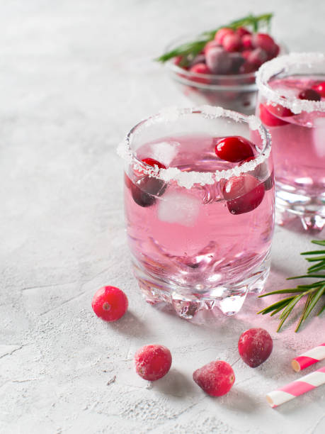 istock Cranberries cocktails with ice, berries and rosemary 996621040