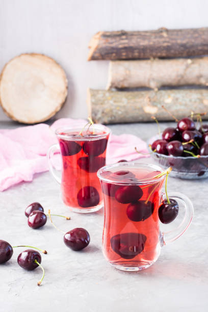 istock Sweet cold compote made from fresh cherries in a glass cup 996622514