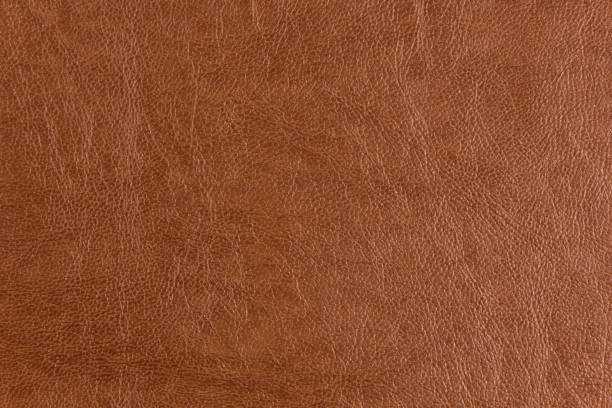 istock Brown Artificial synthetic leather texture background and designing 996633848