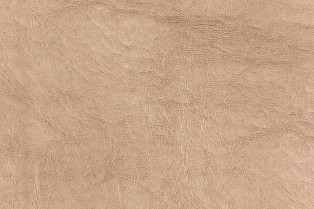 istock Brown Artificial synthetic leather texture background and designing 996639778