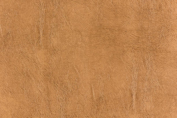 istock Brown Artificial synthetic leather texture background and designing 996640356