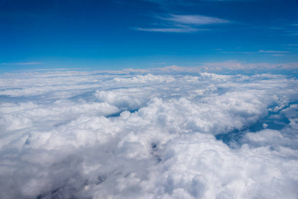 istock aerial view of clouds with bluish sky 996649614