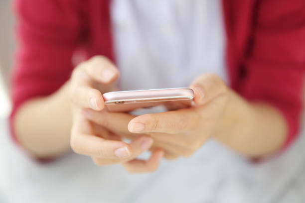 istock one Asian woman with smart phone 996658974