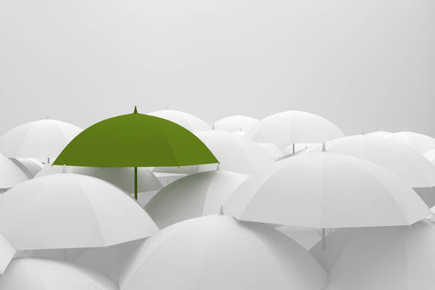 istock Umbrella Standing Out From The Crowd 996658976