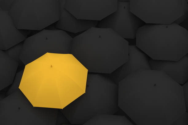 istock Umbrella Standing Out From The Crowd 996659030