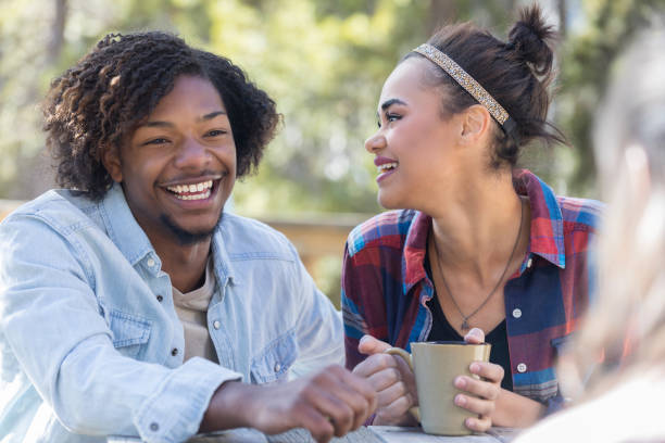 istock Young couple enjoying coffee together 996670112