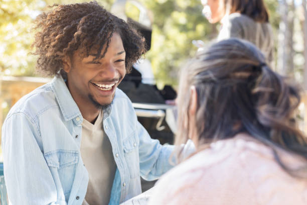 istock Happy man talking with friend outdoors 996670114