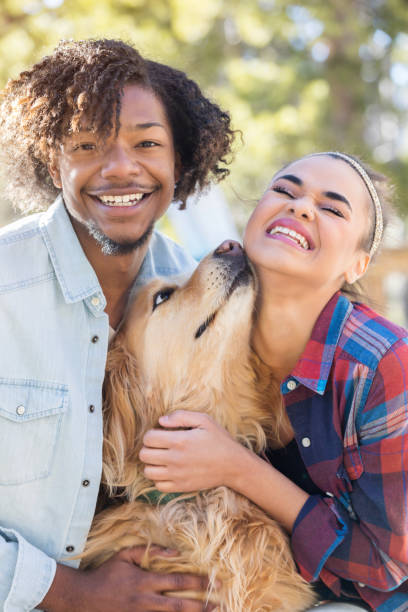 istock Happy couple with adorable dog 996670122