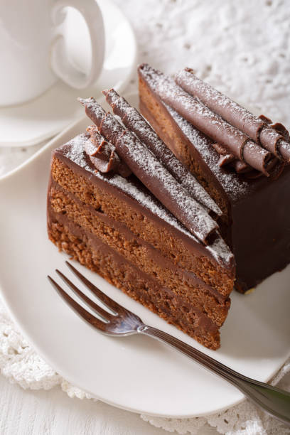 istock beautiful dessert: truffle cake with chocolate chips close up. vertical 996687120