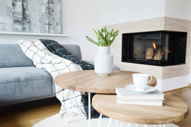 istock Warm living room with fireplace 996692480