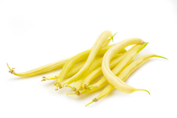 istock Bunch of yellow fresh beans isolated on white 996718356