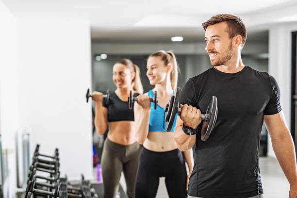 istock Sports training indoors with weights 996721132
