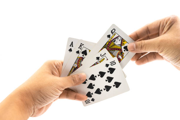 istock Hand of man is holding spade straigt flush isolated 996721406