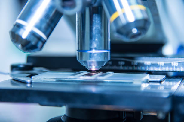 istock Close up medical equipment microscope in blue tone. 996724790