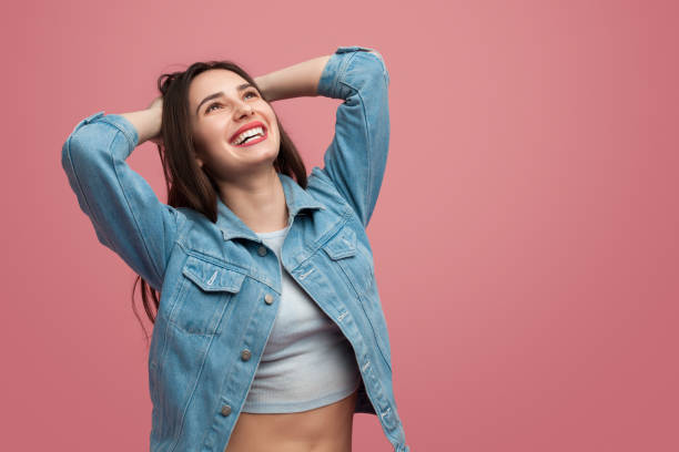 istock Pretty woman laughing and looking up 996730584