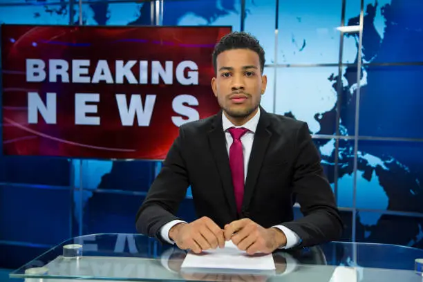 Photo of Breaking news male anchor