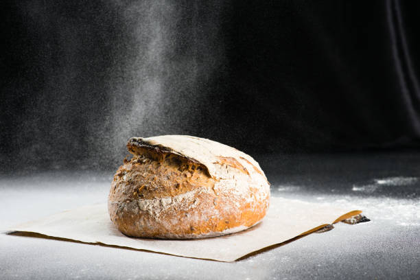 istock traditional round artisan rye bread loaf with walnut and seeds w 996733596