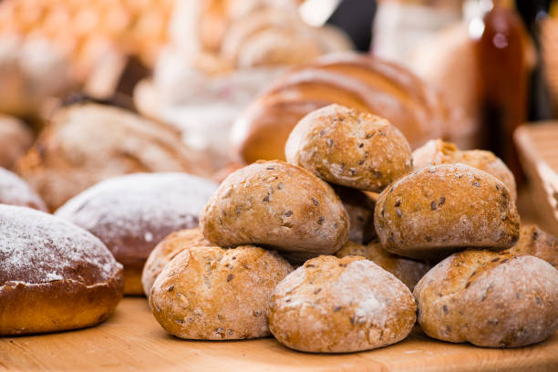 istock on the foreground a traditional round artisan wheat bread loaves 996733906