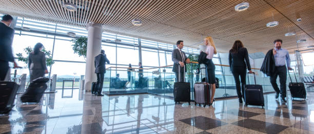 istock Business people at airport 996734384