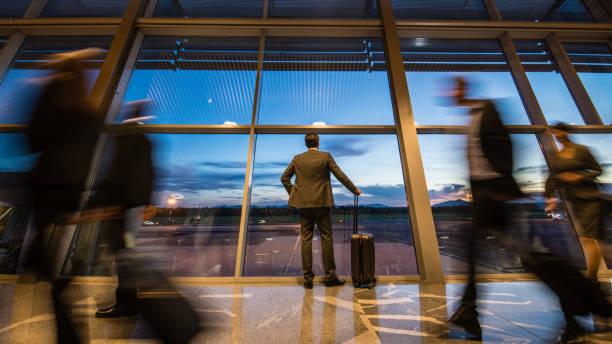 istock Business people at airport 996734476