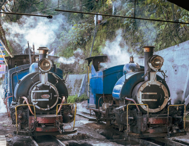 Toy Train The Steam Engine of The Darjeeling Himalayan Railway, also known as the Toy Train ,is a 2 ft narrow gauge railway that runs between New Jalpaiguri and Darjeeling . darjeeling stock pictures, royalty-free photos & images