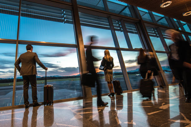 istock Business people at airport 996735284