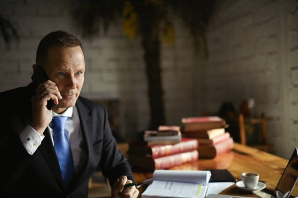 istock Businessman in coffee shop 996735490
