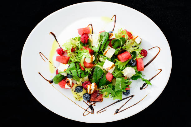 istock classic Italian summer delicious fresh salad with watermelon, ch 996737712