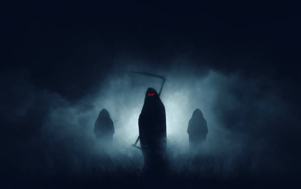 Grim reaper Grim reaper, the death itself, scary horror shot of Grim Reaper in fog holding scythe. murderer photos stock pictures, royalty-free photos & images
