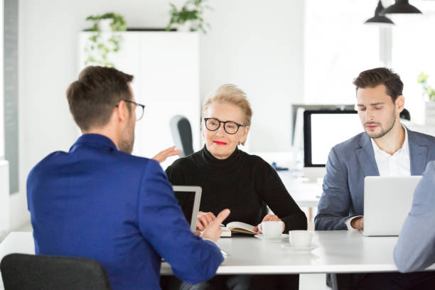 istock Business team having meeting in modern office space 996757020