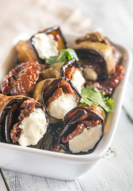 istock Aubergine rolls with cream cheese and sun-dried tomatoes 996758112