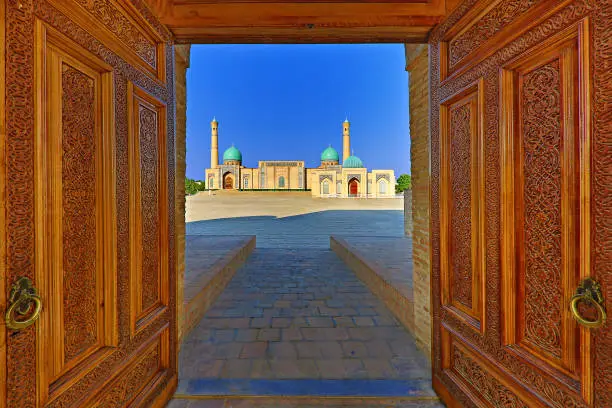 Khast Imam mosque through wooden doors, Tashkent, Uzbekistan