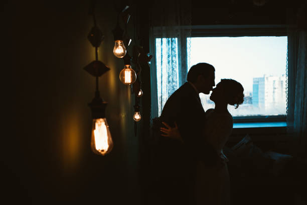 istock couple groom and bride in light studio 996764754