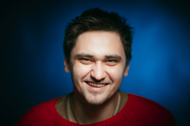 istock emotional young man photo in studio 996765732