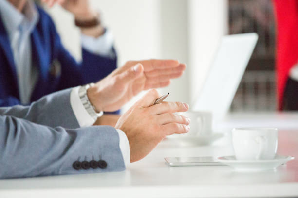 istock Businessman explaining his views during meeting 996769174