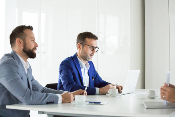 istock Business team discussing strategy in meeting 996770118