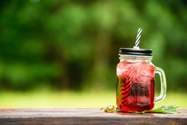 istock catering bar service. selective focus on a red cold lemonade in 996770518