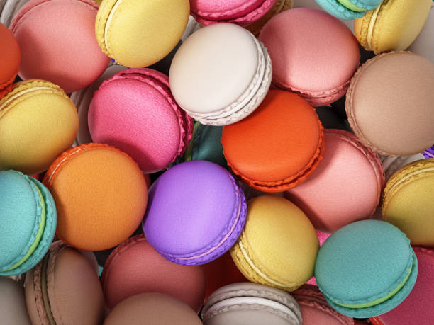 พื้นหลังที่เกิ�ดขึ้นด้วยมาการองที่มีสีสันซ้อนกัน - macaroon ภาพสต็อก ภาพถ่ายและรูปภาพปลอดค่าลิขสิทธิ์