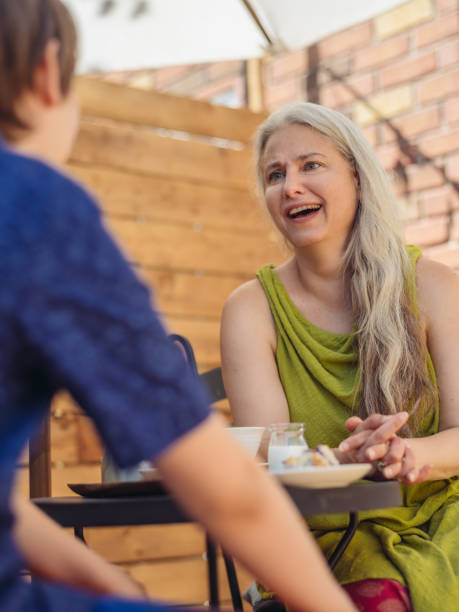 istock Patio time with moter and son 996779820