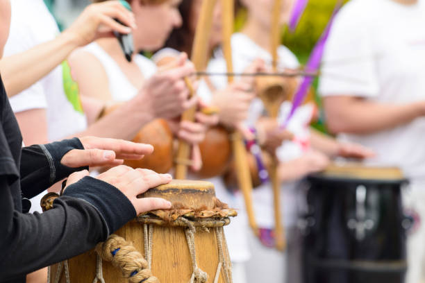 drummer with traditional brazilian drum and drum sticks, selecti - parade band imagens e fotografias de stock