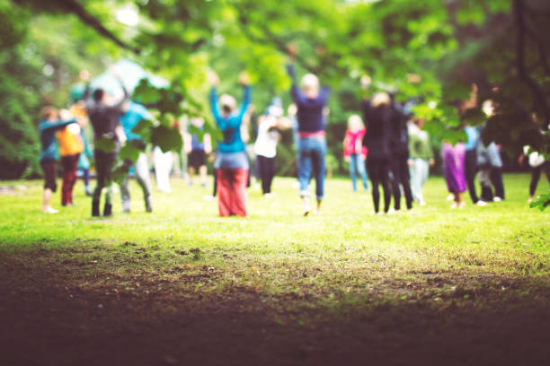 istock People practice yoga and meditation in the group 996783638