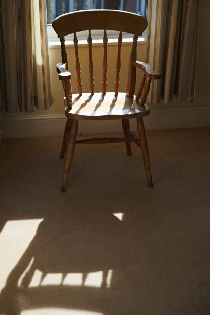istock Vintage wooden chair with shadow 996788228