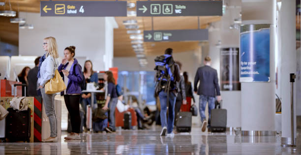 istock Business people at airport 996797800