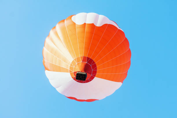istock Colorful unbranded hot-air balloon flying 996800256