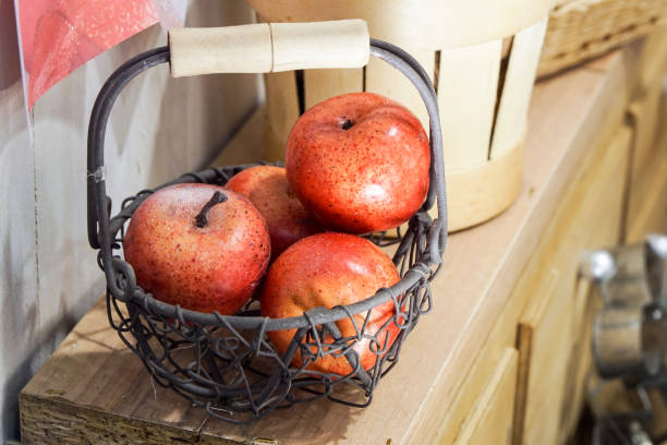 istock Apples in a metal basket on market store 996800950