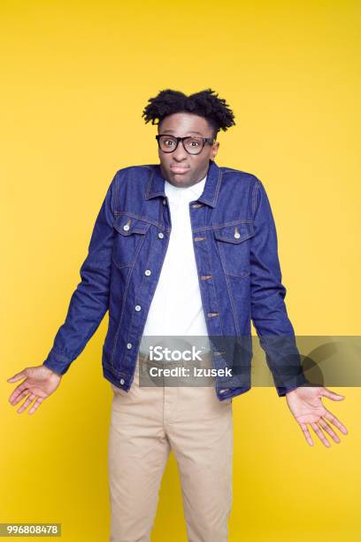 80s Style Portrait Of Confused Nerdy Young Man Stock Photo - Download Image Now - Confusion, Humor, Locs - Hairstyle