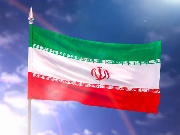 istock Flag of Iran with flare and dark blue sky 996808664