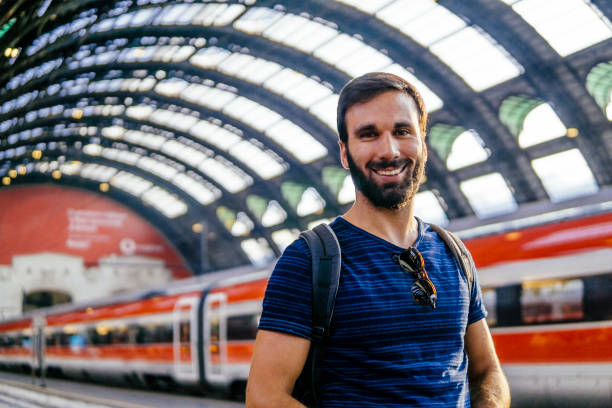 istock Beautiful young man waiting for the train 996822262