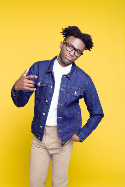 istock 80's style portrait of confident nerdy young man 996829138